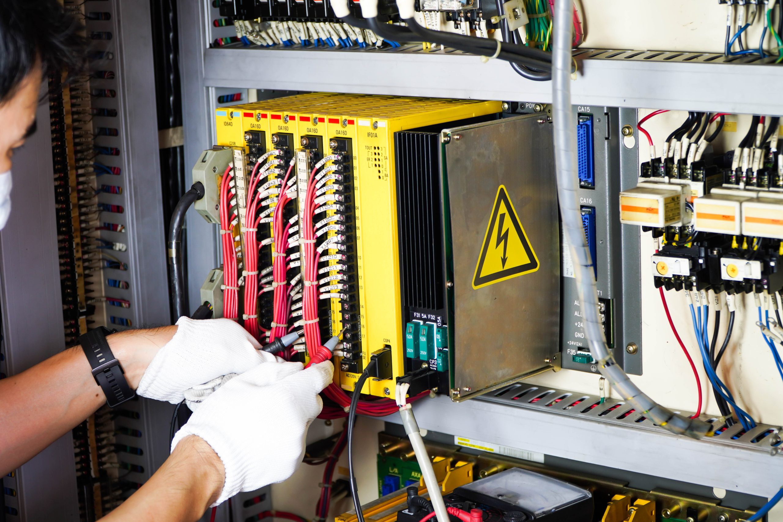 Experts use analog multimeters to inspect circuit boards in industrial plants.Analog multimeter and probe or pin plug